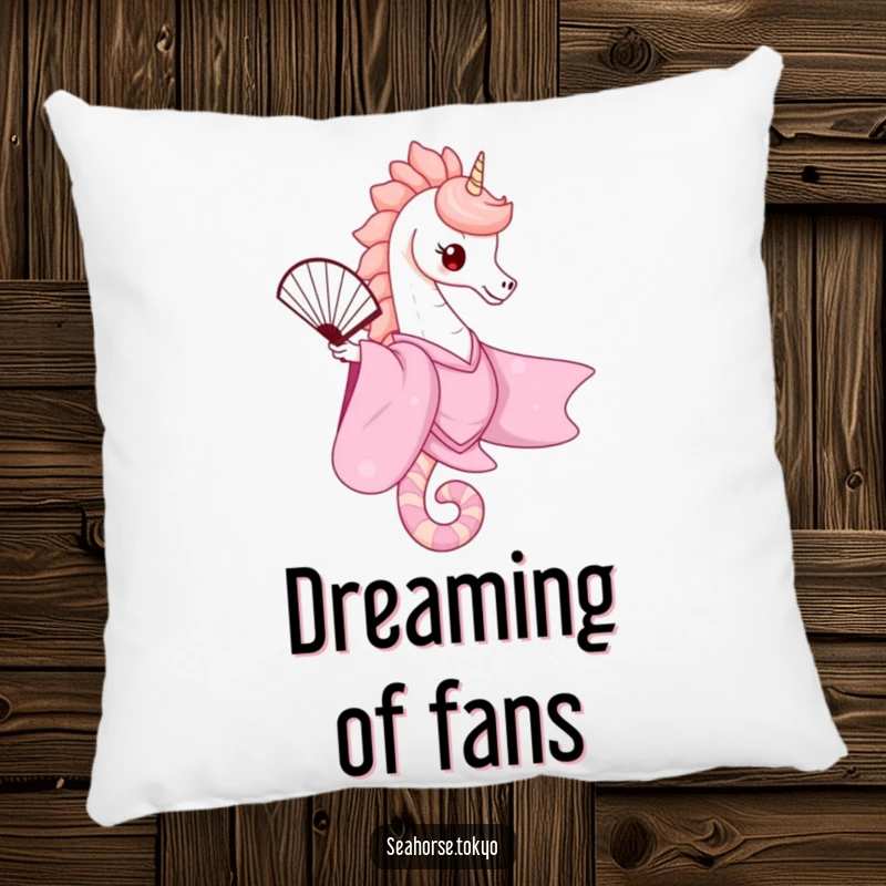 A soft pillow featuring a cute seahorse in a pink kimono gracefully balancing a fan, designed for comfort and adding a touch of elegance.