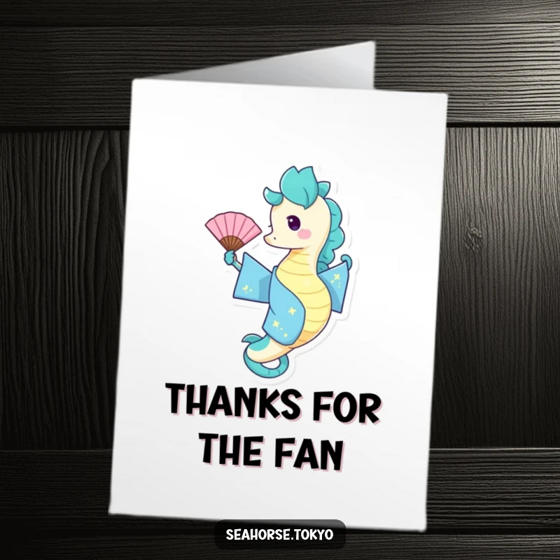 Free Printable Thank You Card: a happy seahorse in a blue kimono waving a fan with pure joy, thanking you.